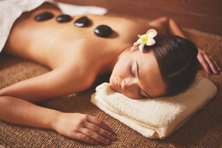 Massage with hot basalt stones