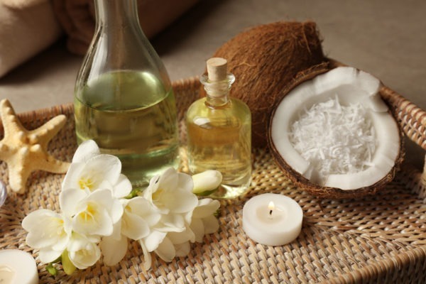 Hot coconut oil massage